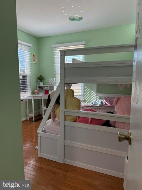 bedroom featuring hardwood / wood-style floors