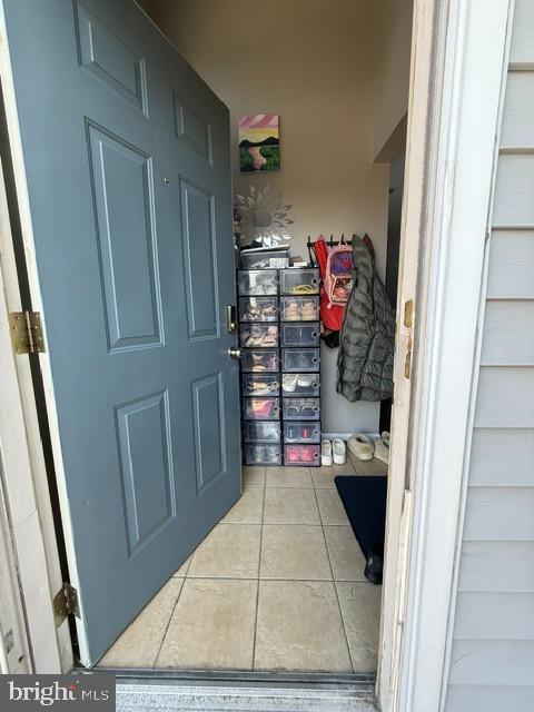 mudroom with tile patterned flooring