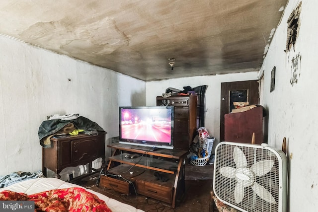 bedroom with concrete floors