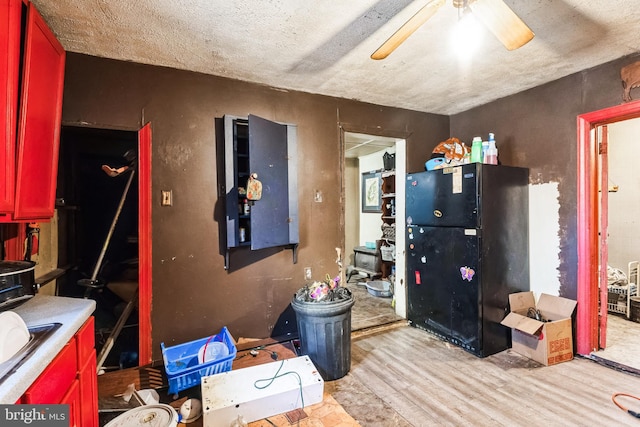 miscellaneous room with ceiling fan and light wood finished floors