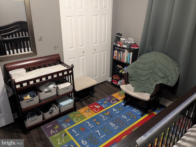 bedroom with a closet and wood finished floors