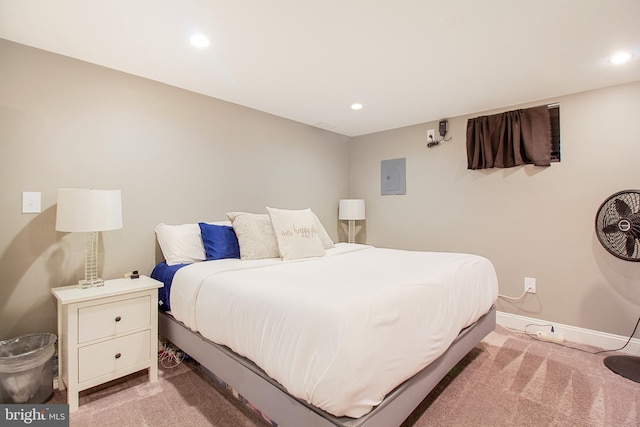 bedroom with electric panel, baseboards, carpet floors, and recessed lighting