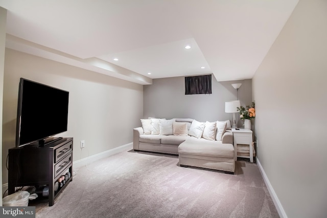 living room featuring recessed lighting, baseboards, and carpet floors