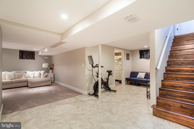 exercise room with recessed lighting, baseboards, and visible vents