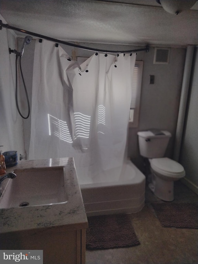 bathroom featuring visible vents, toilet, vanity, a textured ceiling, and shower / bathtub combination with curtain