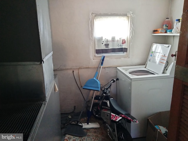 washroom featuring laundry area and washer / clothes dryer