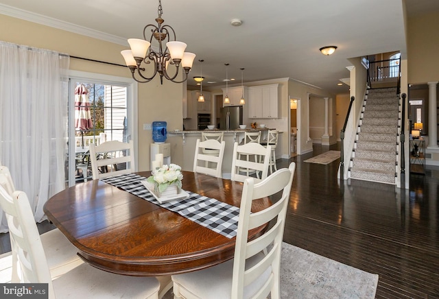 dining area with a chandelier, stairs, crown molding, and dark wood-type flooring