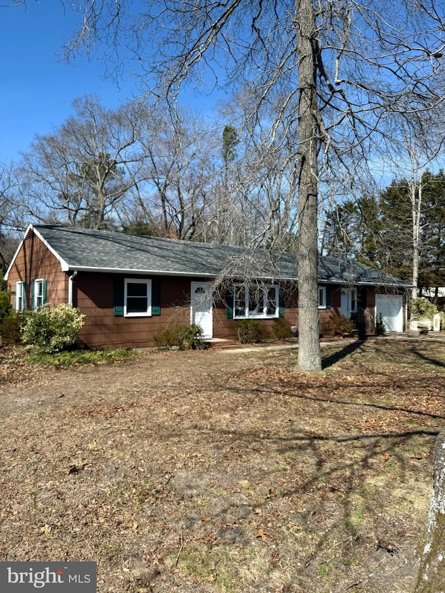 ranch-style home with an attached garage