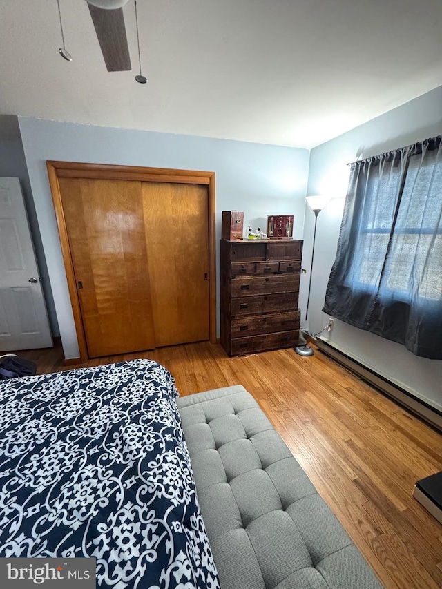 bedroom with a closet and light wood-style floors