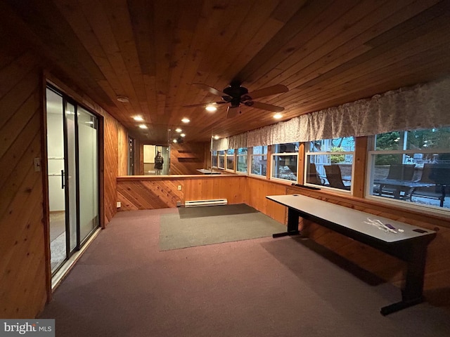 rec room featuring a baseboard heating unit, carpet floors, wood ceiling, and wooden walls