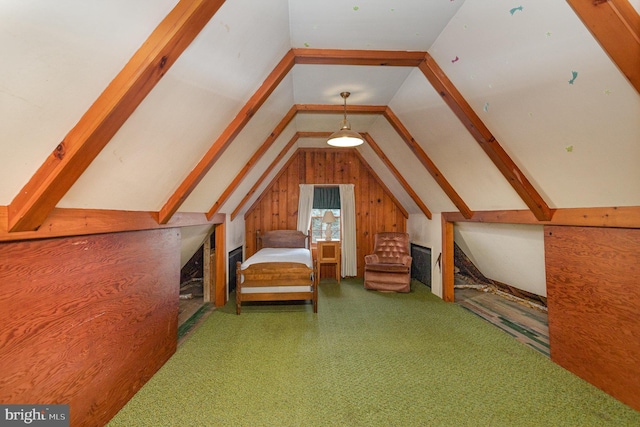 unfurnished bedroom with lofted ceiling and wooden walls