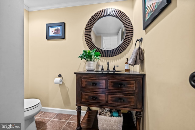 half bath featuring baseboards, toilet, ornamental molding, tile patterned floors, and vanity