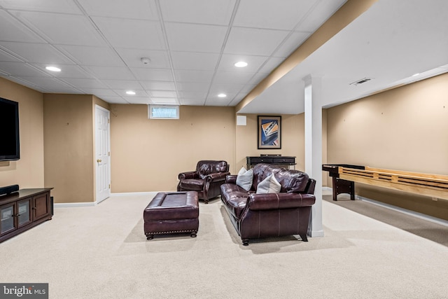 carpeted living room featuring recessed lighting, visible vents, baseboards, and a paneled ceiling