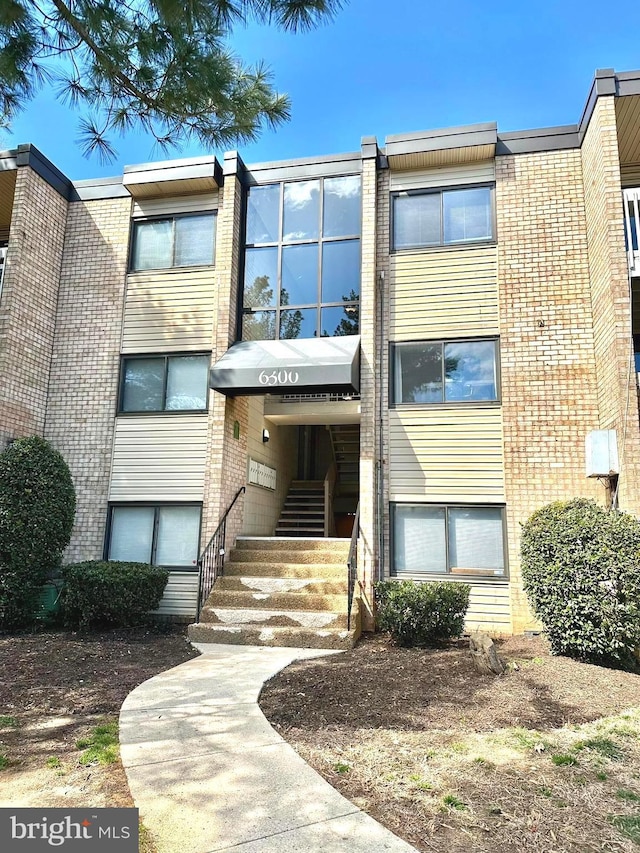 view of building exterior featuring entry steps