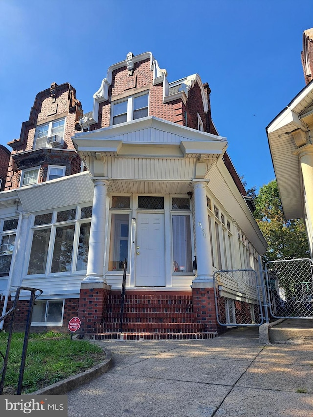 view of front of home with brick siding