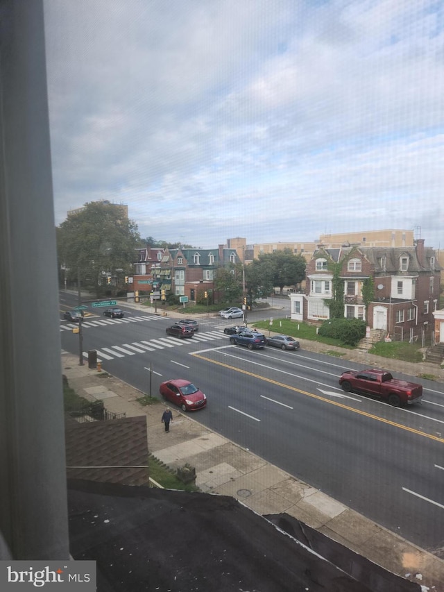 view of street featuring sidewalks and curbs