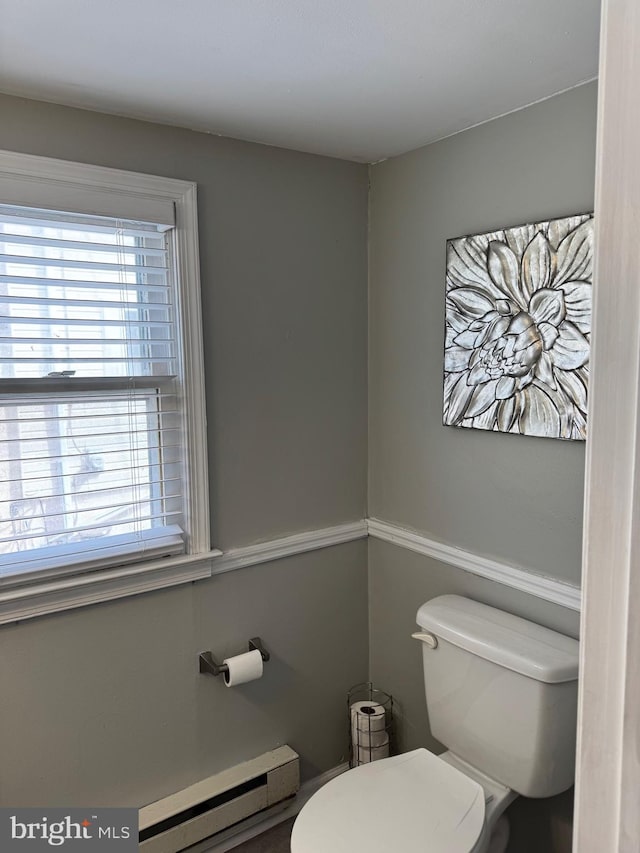 bathroom featuring toilet and a baseboard radiator