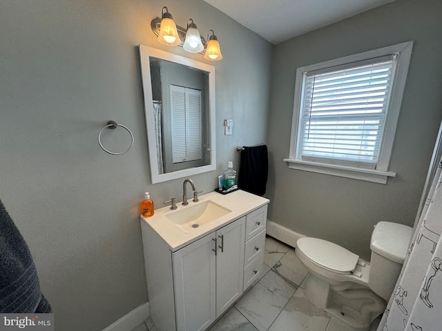 bathroom featuring vanity, toilet, baseboards, and marble finish floor