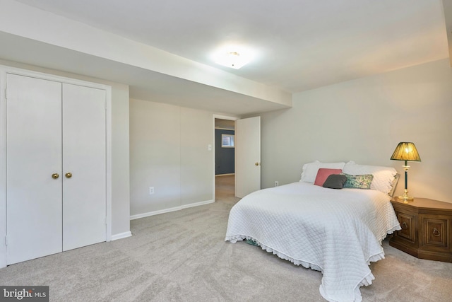 carpeted bedroom with a closet