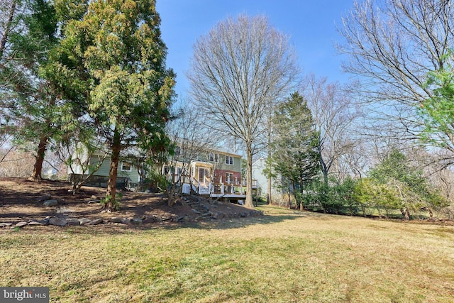 view of yard featuring a deck