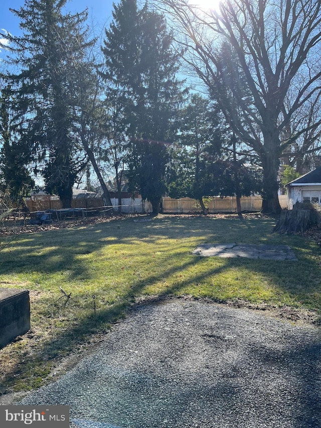 view of yard with fence