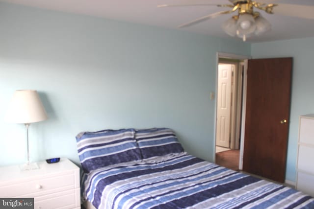 bedroom featuring ceiling fan