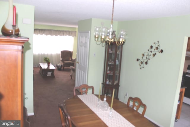 dining room featuring a chandelier