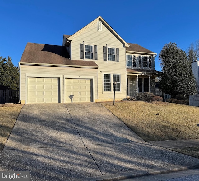 traditional-style house featuring driveway