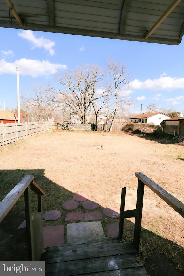 view of yard featuring fence