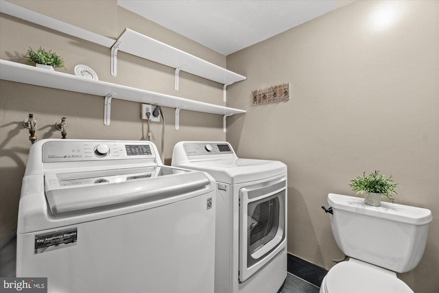 laundry room with laundry area and washer and clothes dryer