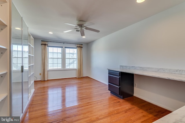 interior space with recessed lighting, light wood-style flooring, baseboards, and ceiling fan