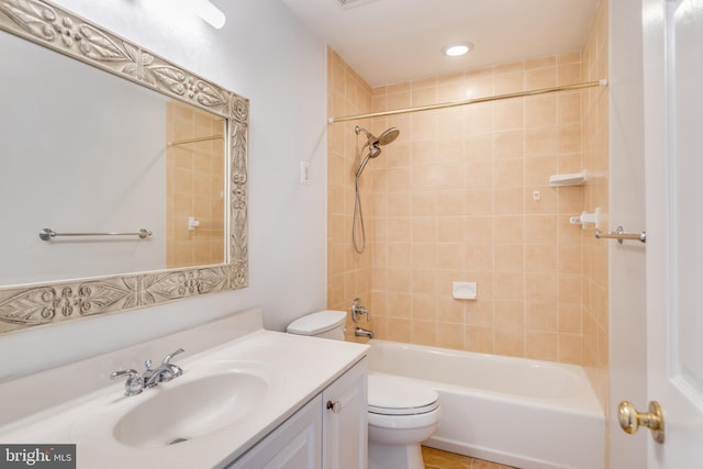 full bathroom with shower / tub combination, toilet, and vanity