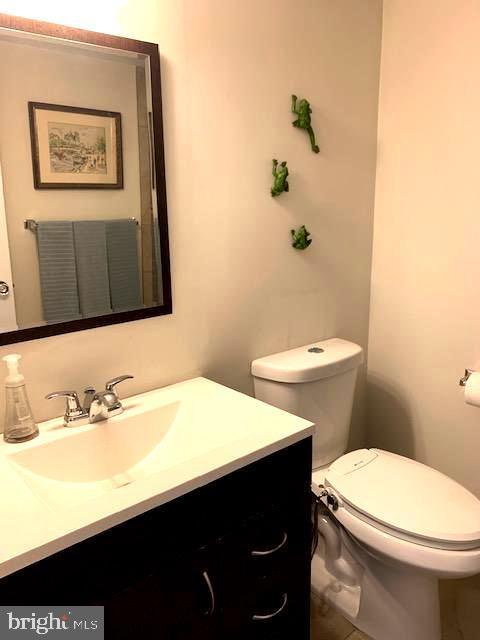 half bath with toilet and vanity