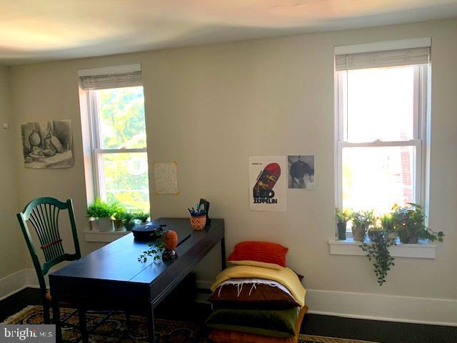 dining area featuring baseboards