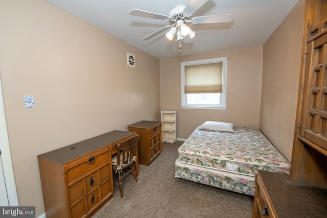 carpeted bedroom with a ceiling fan