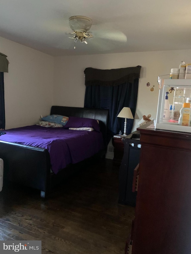 bedroom featuring wood finished floors