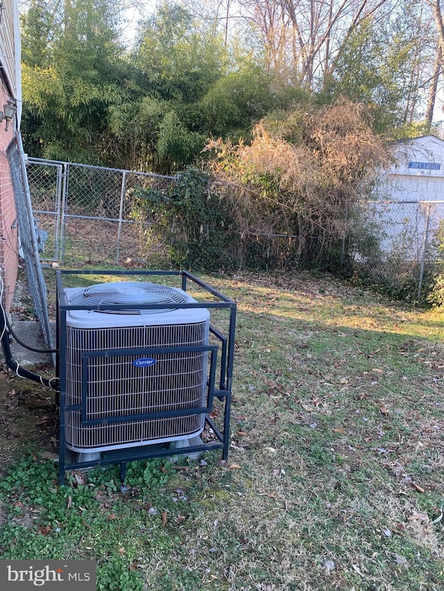 exterior details with fence and central AC