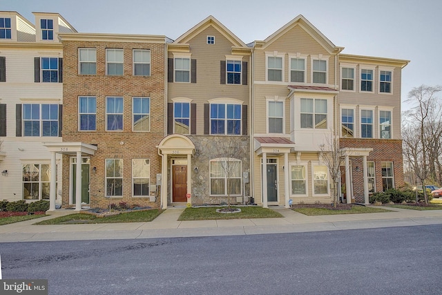 multi unit property with brick siding