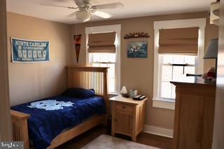 bedroom featuring baseboards