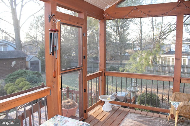 sunroom / solarium with lofted ceiling