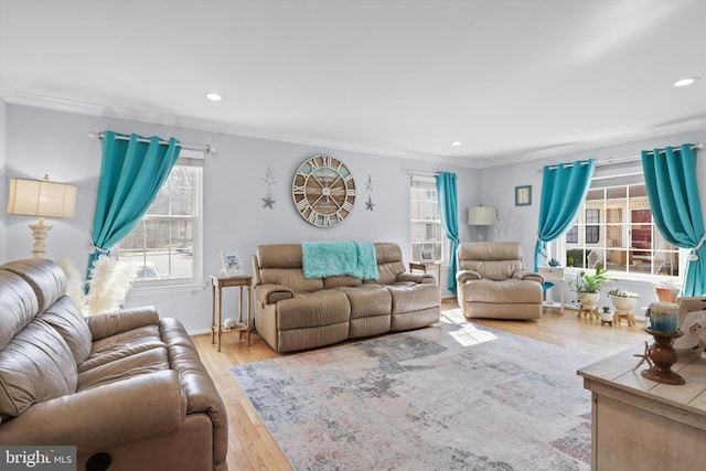 living room featuring recessed lighting, wood finished floors, and ornamental molding