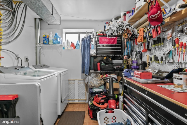 laundry area with laundry area and washer and clothes dryer