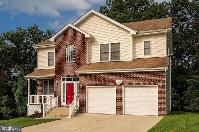 traditional-style home with a porch, concrete driveway, a garage, and brick siding