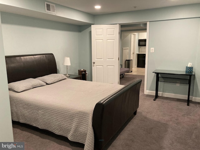 bedroom featuring recessed lighting, carpet, visible vents, and baseboards