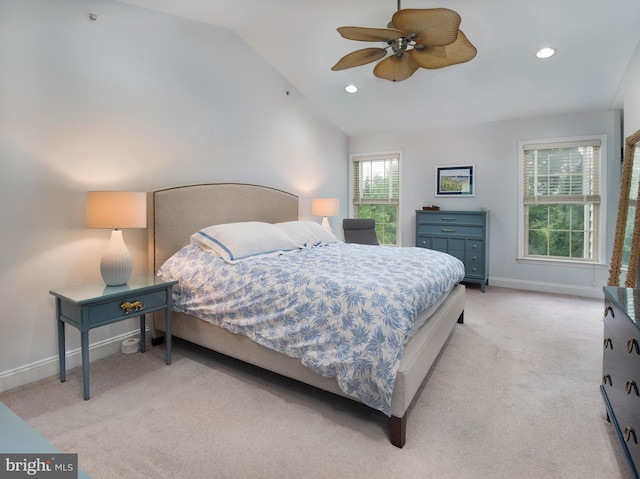 bedroom with a ceiling fan, baseboards, recessed lighting, vaulted ceiling, and light colored carpet