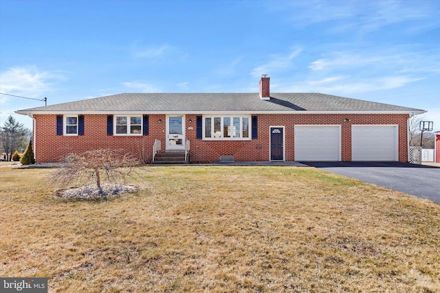 single story home featuring a garage, brick siding, a chimney, and driveway