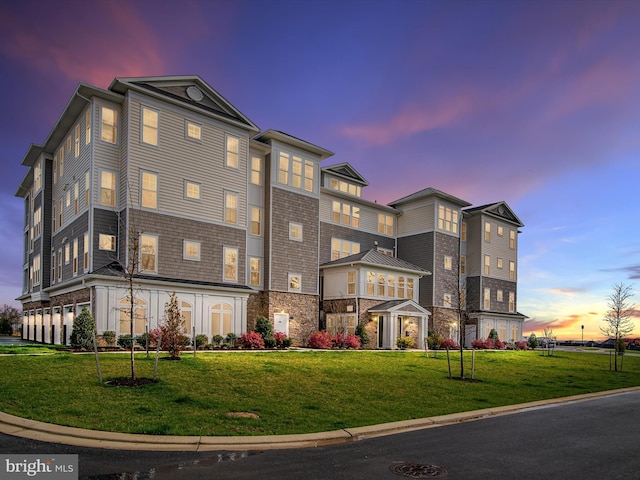 view of property at dusk