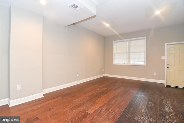 interior space featuring recessed lighting, baseboards, visible vents, and wood-type flooring