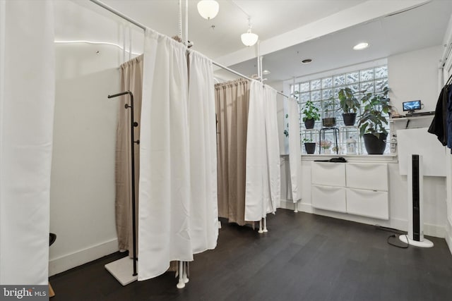 bathroom featuring recessed lighting, baseboards, wood finished floors, and a shower with shower curtain