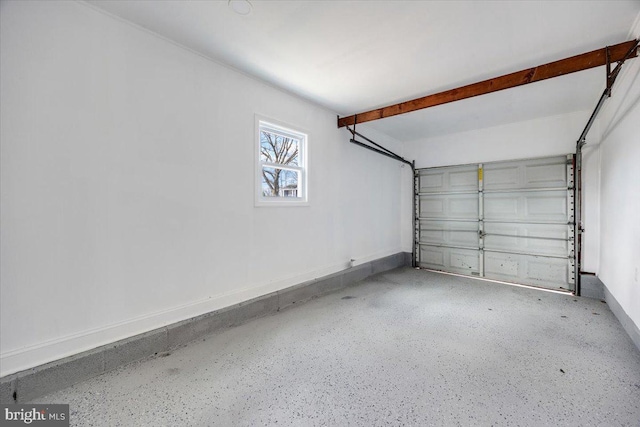 garage with baseboards